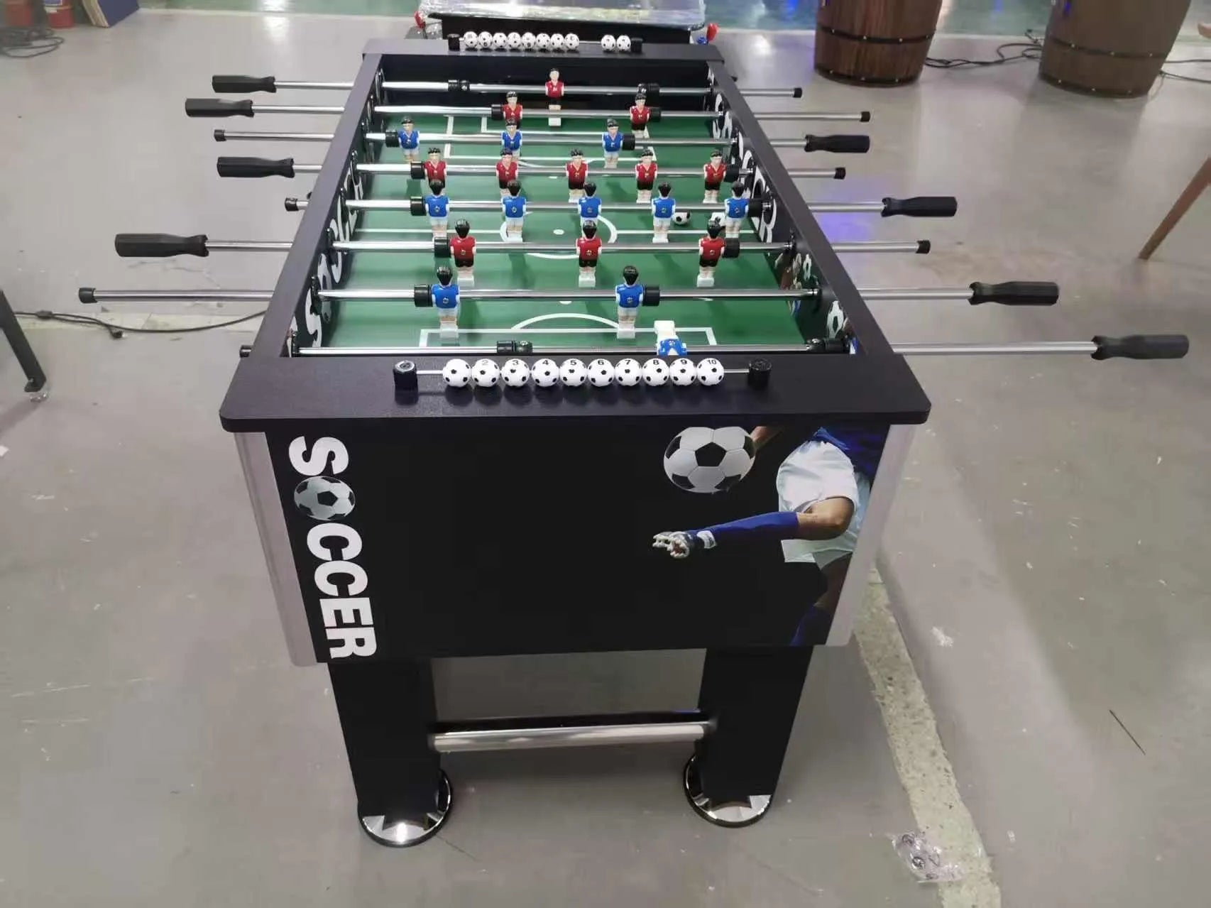 Goalmaster Stadium™ Foosball Table | Real Wood Soccer Graphic Premium Foosball Table w/ Soccer Ball Score Markers
